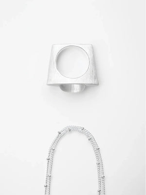 ON IISLAND OVAL CLEAR QUARTZ PENDANT RING | TROVE & TONE
