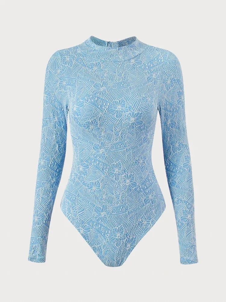 Wavvves FLORAL EMBOSSED LONG SLEEVE SURF SWIMSUIT BLUE | TROVE & TONE