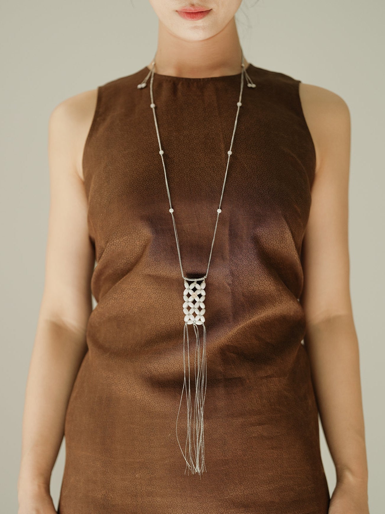 UNIGANCE.Z YUAN POUCH NECKLACE | TROVE & TONE