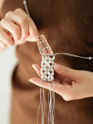 UNIGANCE.Z YUAN POUCH NECKLACE | TROVE & TONE