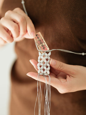 UNIGANCE.Z YUAN POUCH NECKLACE | TROVE & TONE