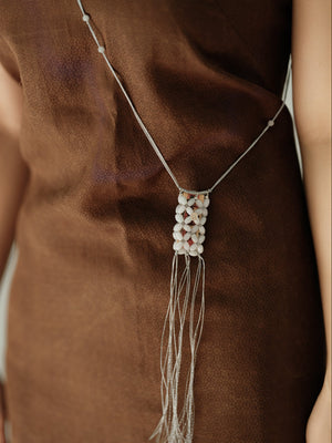 UNIGANCE.Z YUAN POUCH NECKLACE | TROVE & TONE