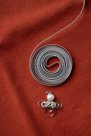 WANYEE CRAFT WOVEN LUCKY CLOUD KNOT PEARL NECKLACE | TROVE & TONE