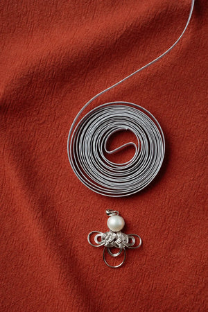 WANYEE CRAFT WOVEN LUCKY CLOUD KNOT PEARL NECKLACE | TROVE & TONE