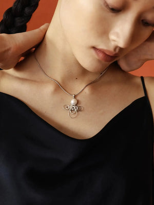 WANYEE CRAFT WOVEN LUCKY CLOUD KNOT PEARL NECKLACE | TROVE & TONE