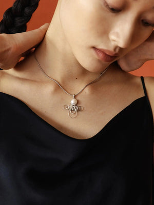 WANYEE CRAFT WOVEN LUCKY CLOUD KNOT PEARL NECKLACE | TROVE & TONE
