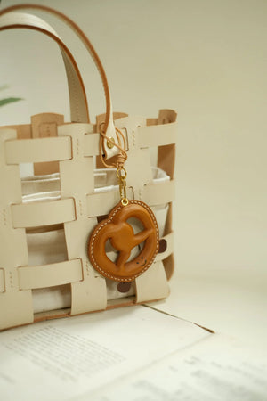 ChengTian HANDMADE LEATHER PRETZEL CHARM | TROVE & TONE