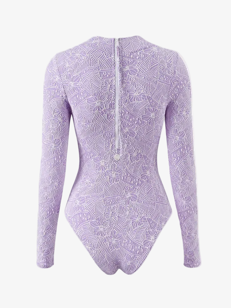 Wavvves FLORAL EMBOSSED LONG SLEEVE SURF SWIMSUIT PURPLE  |  TROVE & TONE