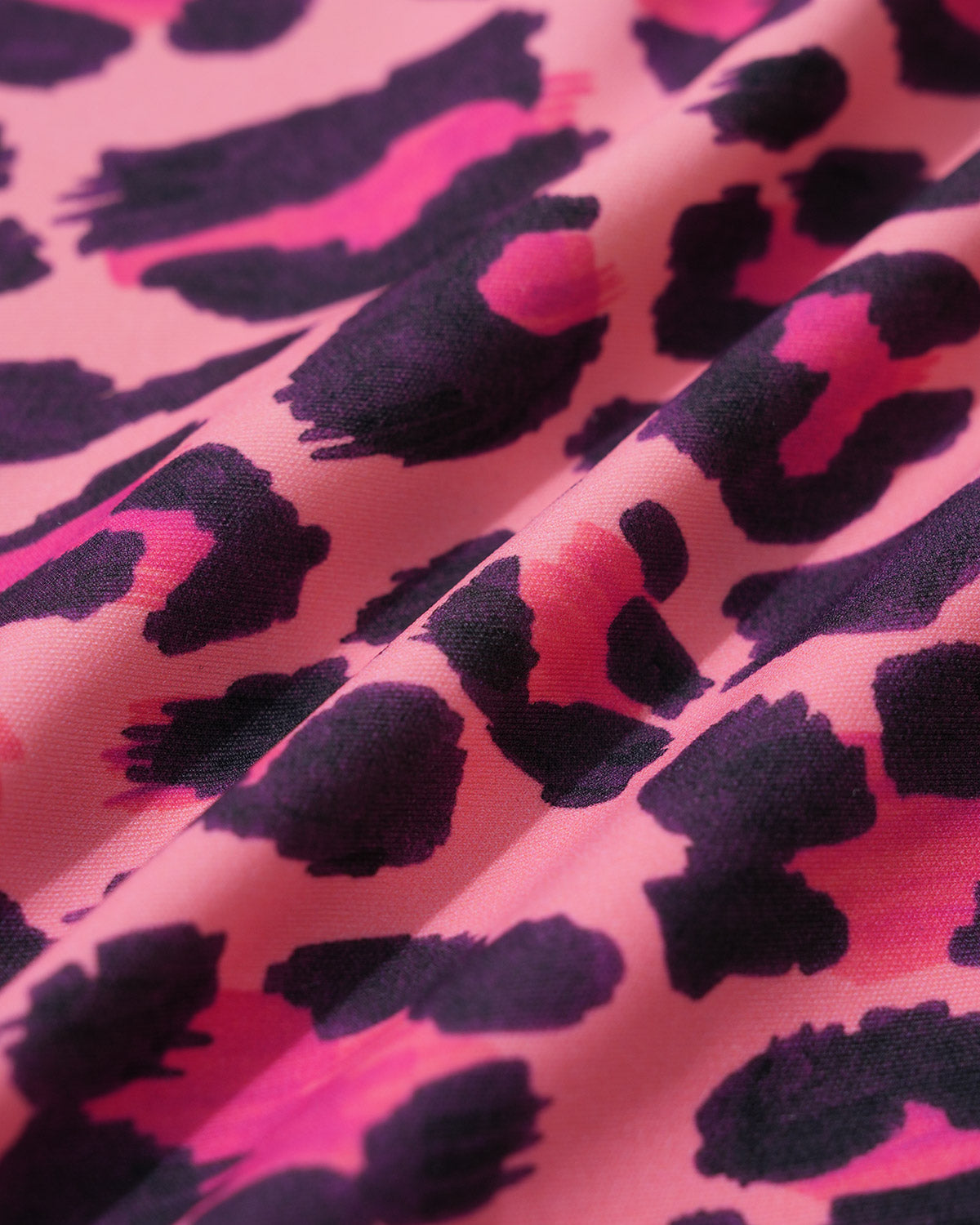 Wavvves LEOPARD PRINT V-NECK LONG SLEEVE SURF SWIMSUIT  |  TROVE & TONE