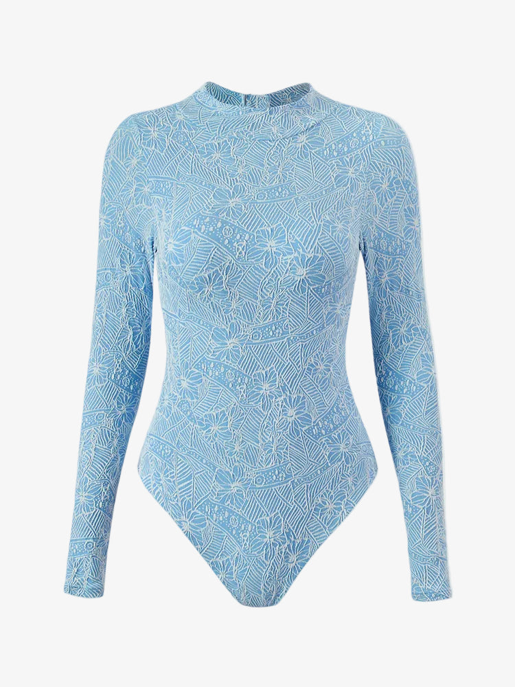 Wavvves FLORAL EMBOSSED LONG SLEEVE SURF SWIMSUIT BLUE  |  TROVE & TONE