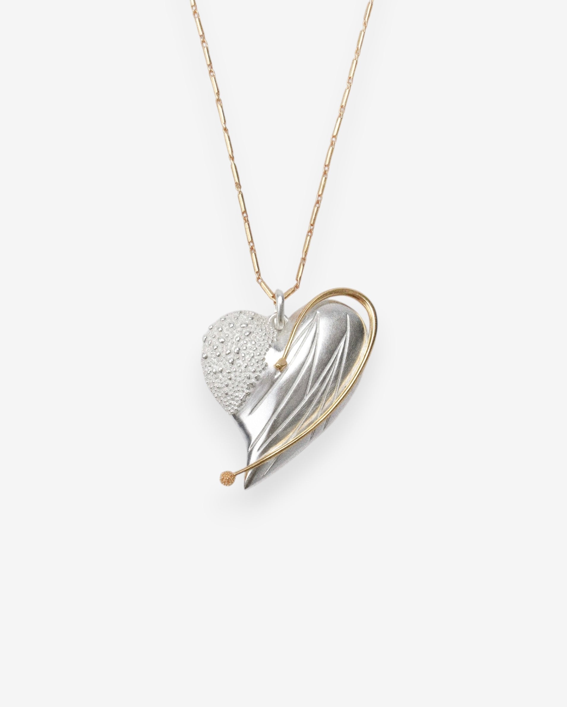 ASYMMETRICAL MOLTEN HEART NECKLACE
