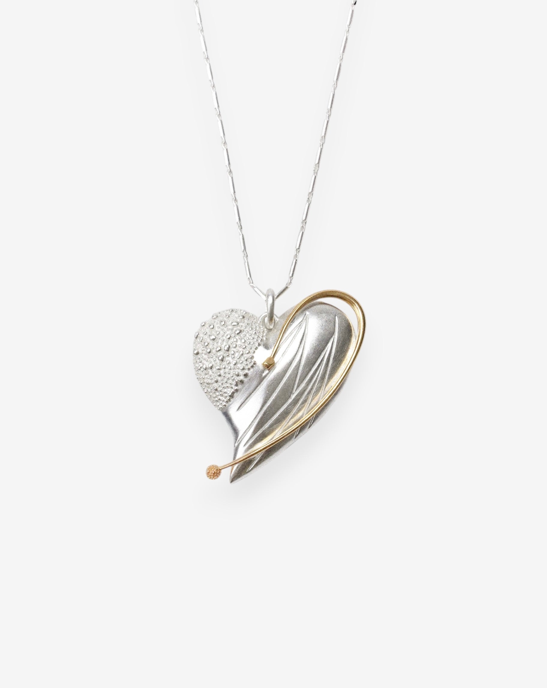 ASYMMETRICAL MOLTEN HEART NECKLACE