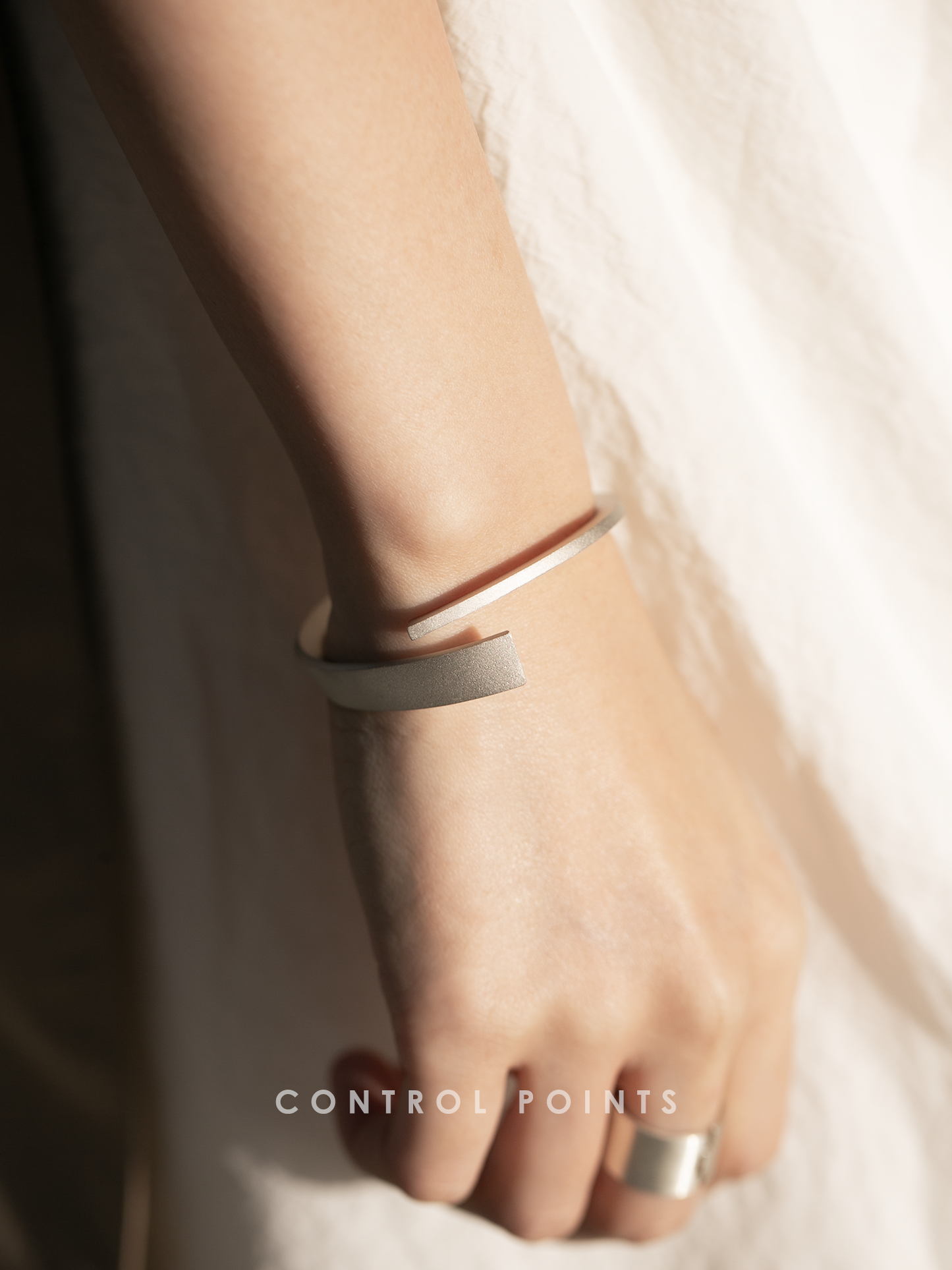 CONTROL POINTS Asymmetric Mobius Loop Cuff  |  TROVE & TONE