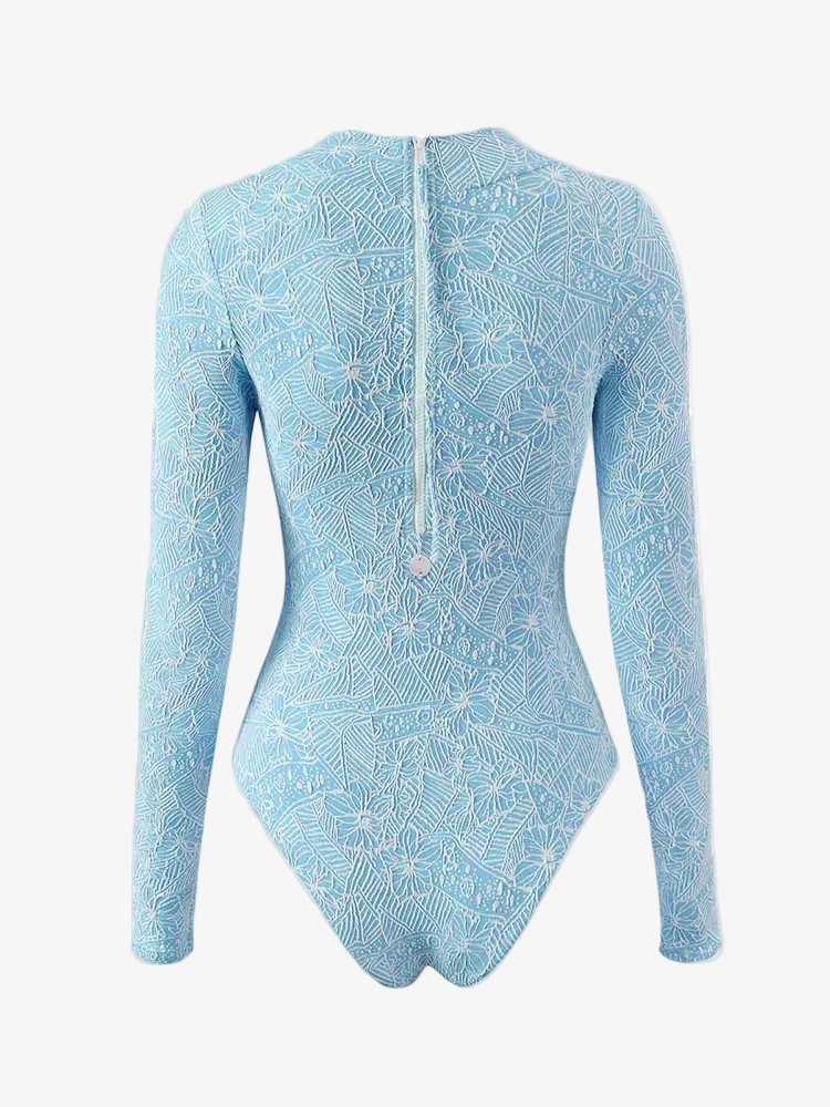 Wavvves FLORAL EMBOSSED LONG SLEEVE SURF SWIMSUIT BLUE  |  TROVE & TONE