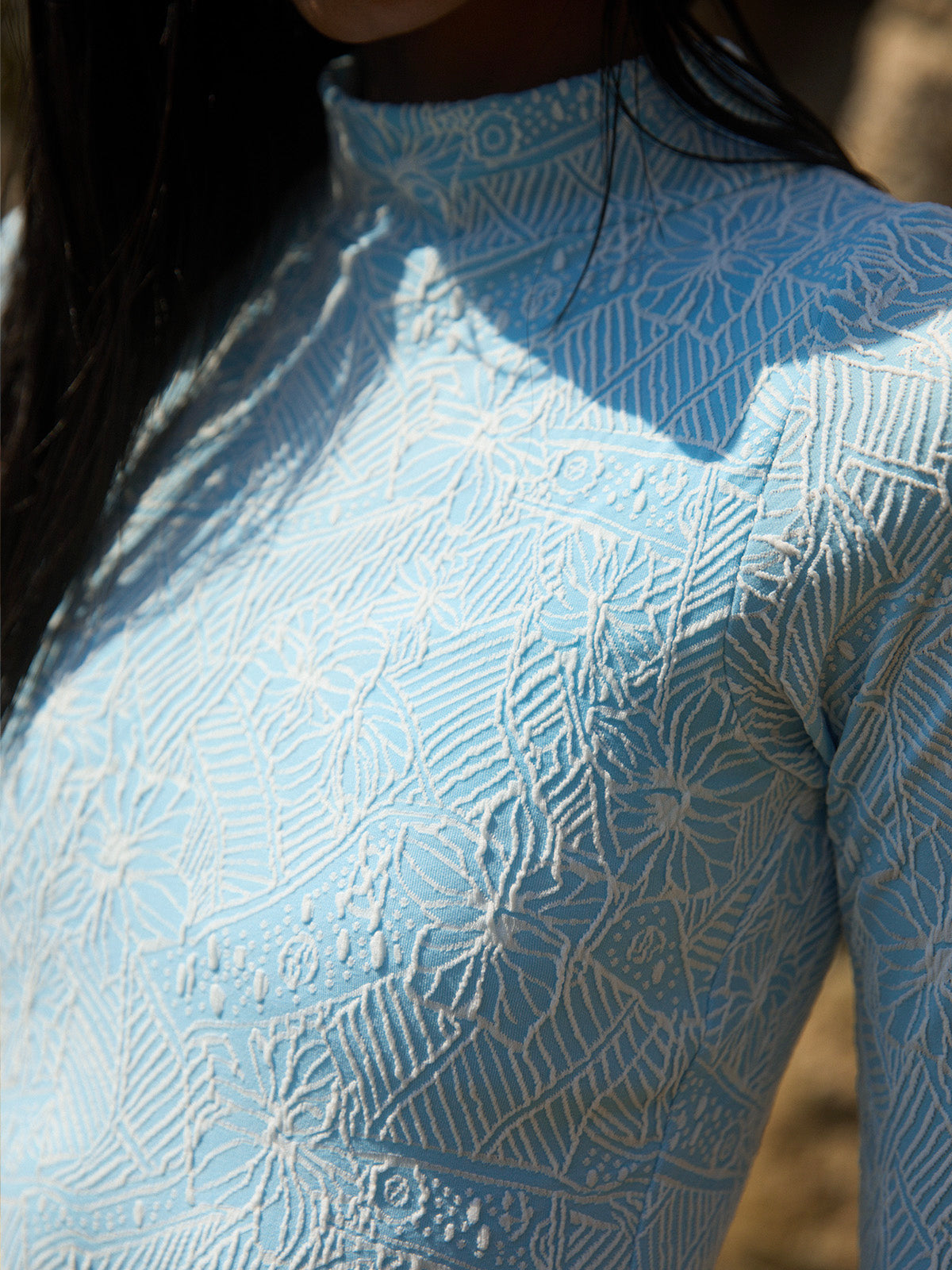 Wavvves FLORAL EMBOSSED LONG SLEEVE SURF SWIMSUIT BLUE  |  TROVE & TONE