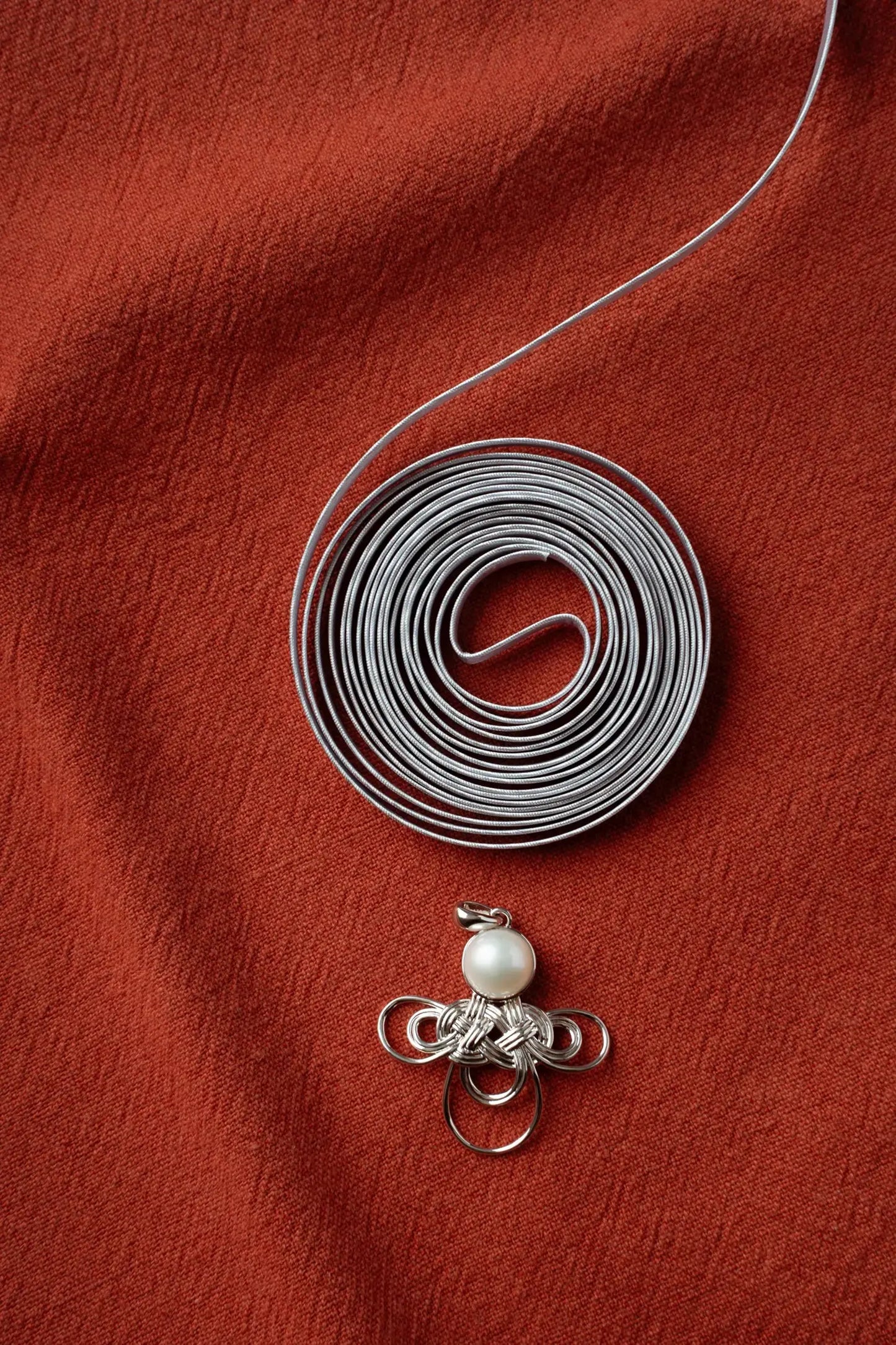  WANYEE CRAFT WOVEN LUCKY CLOUD KNOT PEARL NECKLACE |  TROVE & TONE