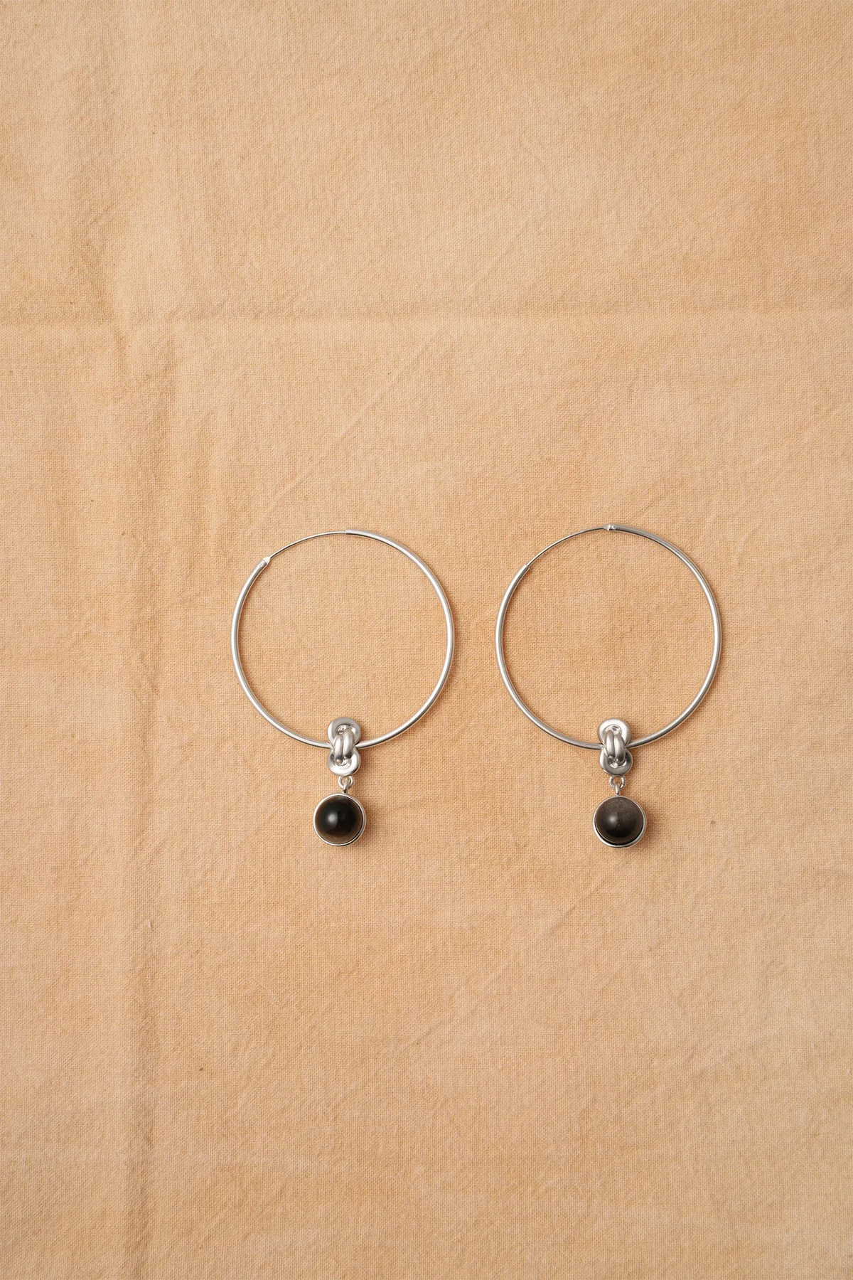  WANYEE CRAFT MATTE SILVER OBSIDIAN KNOT HOOP EARRINGS |  TROVE & TONE