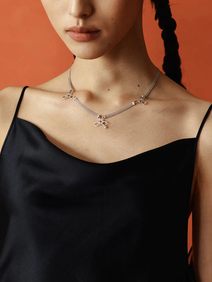  WANYEE CRAFT INTERLOCKING DOUBLE COIN KNOT NECKLACE |  TROVE & TONE